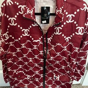 CHANEL Burgundy thin rain  Jacket with White CC Monogram.